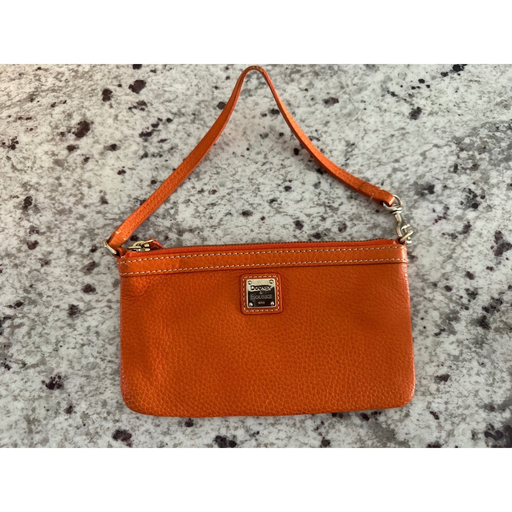 Dooney & Bourke pebble grain large slim wristlet bag in orange